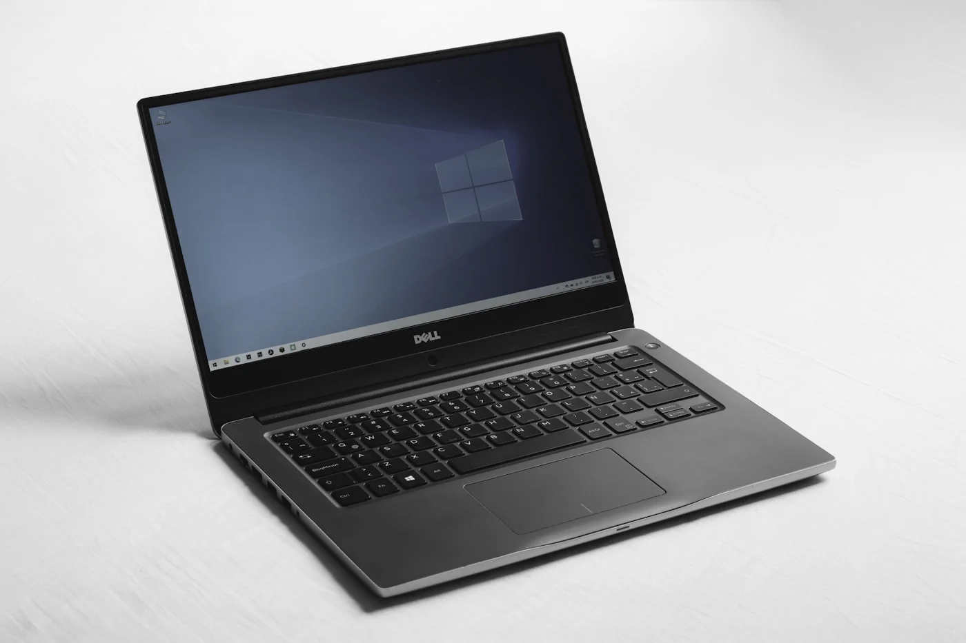 Laptop open on a workbench ready for affordable repair in Orange County